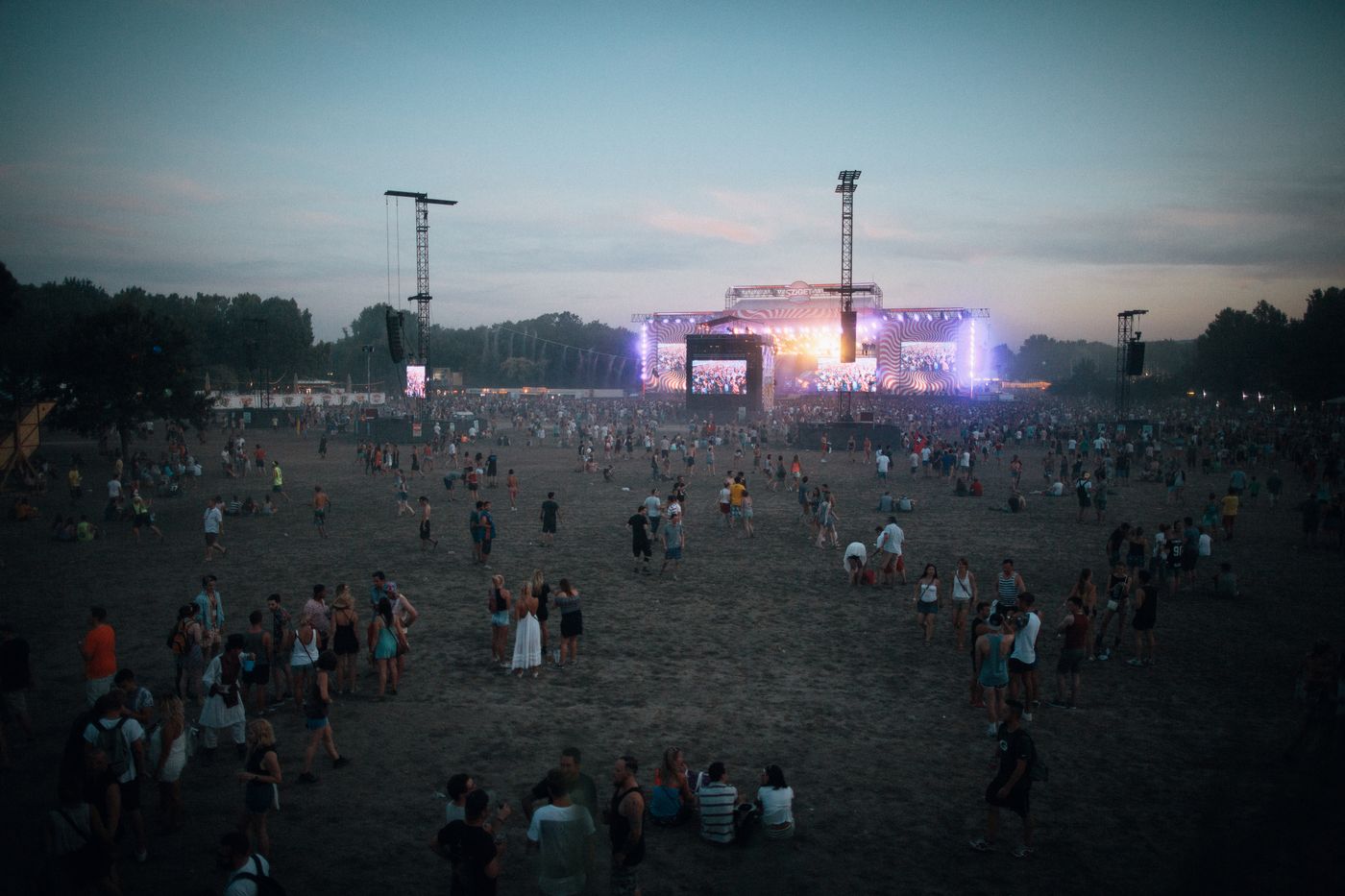 Concert stage with lights and crowd
